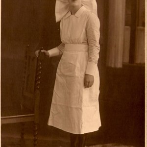 Elodie in nurse's uniform