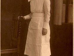 Elodie in nurse's uniform
