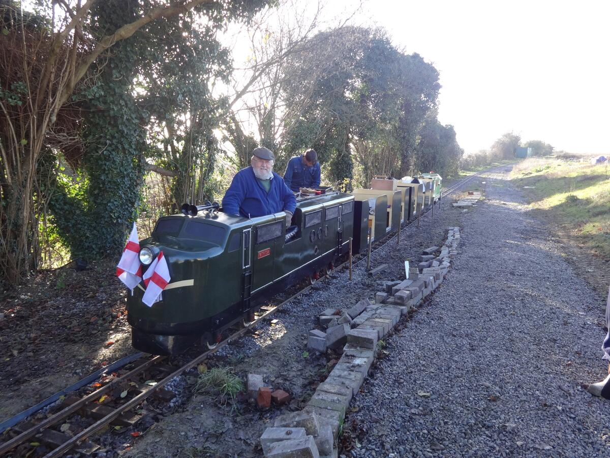 First complete train reaches marked out site of new station.