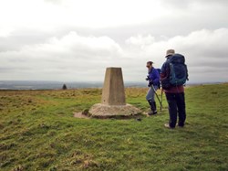 And looking south out to sea*....two of the group at the trig point, glorious views. Jane did us proud. ©PT