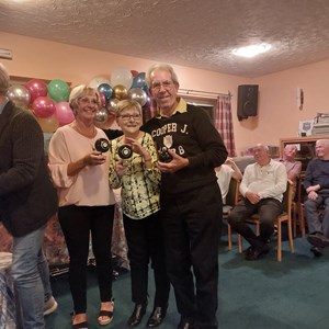 Chris Wright, Catriona Griggs and Gus Edwards with their Triples Finalists Trophies