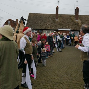 Morris dancers lined up ready to dance