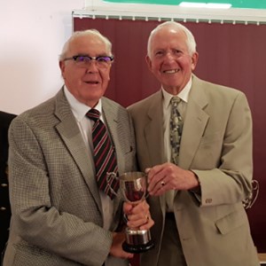 Colin Smale receiving the Men v Ladies Cup