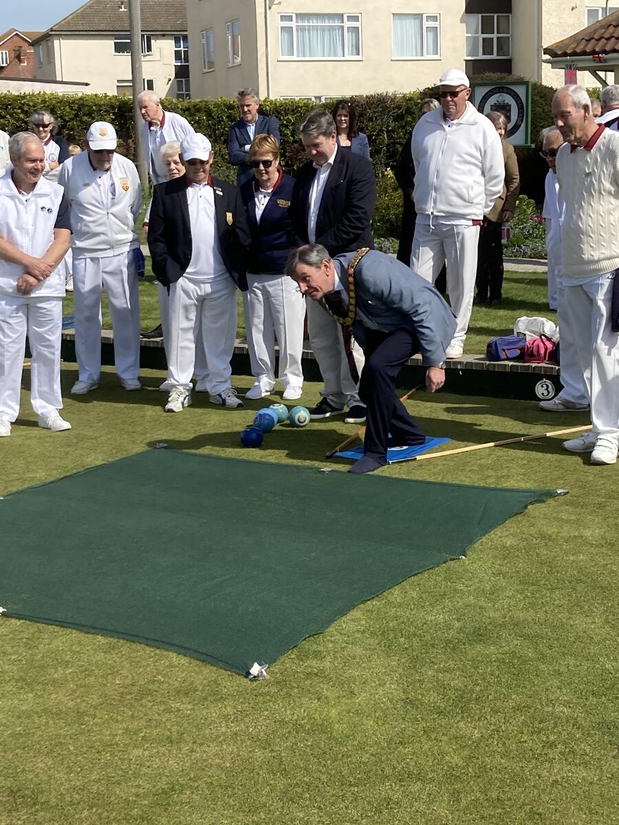Chairman of TDC Jeff Bray rolls a bowl then declares our Centenary Year open