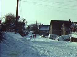 From Domesday Reloaded - Snowscene of the 1982 winter,showing the main street,plus a terrace of new houses in Great Coxwell.It also shows a recently renovated cottage.