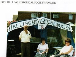 Founder members (Ted Gowers on left) man an HHS tent in 1985