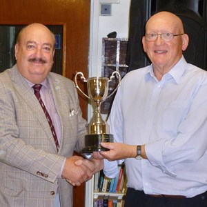 Presentation Evening 2022 Mike Howe Champion being presented with his trophy by County Councillor Ken Crofton