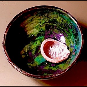 Rockpool Find :Wheel thrown terracotta bowl with copper oxide and clear glaze by Jan Flynn