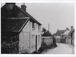 View south along main street - on L: Pieman's Thatch (before re-roofing); in distance: The Royal Oak public house (Halls) (closed before 1965). pre-1965