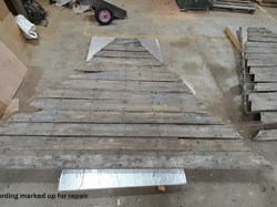 Underboarding marked up for repair