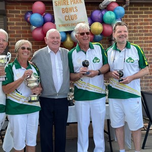 Fred Goodege, President presents some trophies