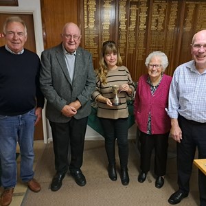 Anne presenting the Alec Whittaker Runners Up Trophy to Mark S, Arthur, Lara & Byron
