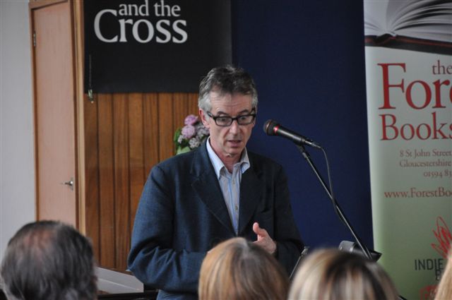 Comic poet John Hegley in performance and a workshop expressing a mood in a local school