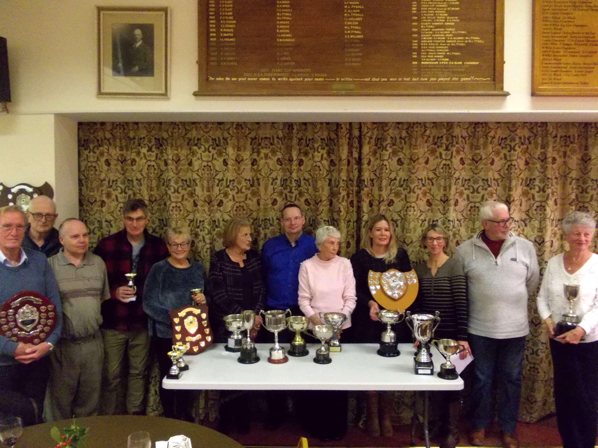 Winners collecting their trophies on presentation evening