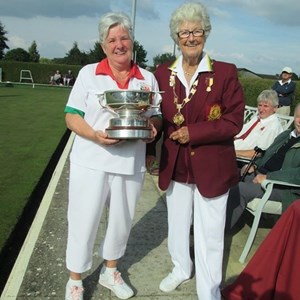 County Finals Day at Fosseway Bowls Club. Heather receiving her County Ladies Singles trophy from Somerset Ladies President Dawn Barnaby.