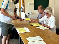 David and Jill updating the scores