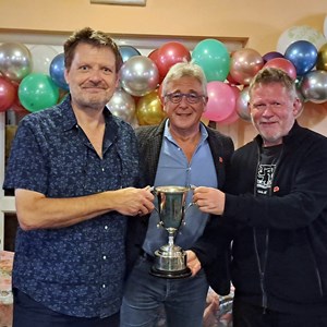 Richard Griggs and Martin Taylor being presented with their Drawn Pairs winners Trophy by Paul Ugo