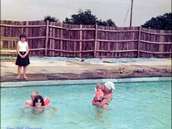 Lynne & Penny Stott with Maria Reed on the side of the pool