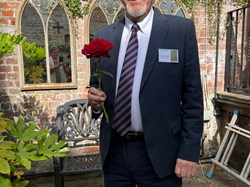 Cllr Mel Flint with the rose for the 2025 ceremony