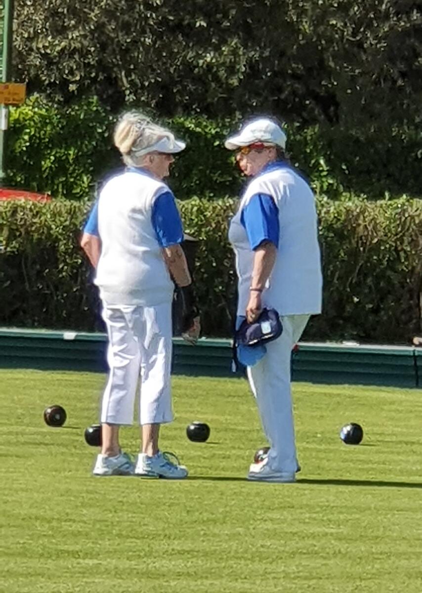 Denise and Anne discussing their next move