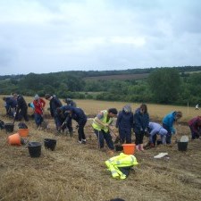 Volunteers at work on the largest of the trenches