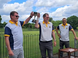 And there's the first trophy of the season, in the hands of the victors