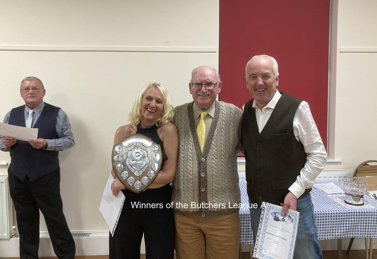 The Secretary, Roy Mountford, presents the Marsh Butchers Shield to Dean and Vanessa Townend at the 2023 Presentation Dinner.