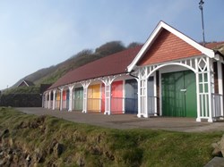 Beach huts on South Bay before the landslide