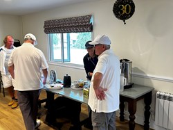 Annie at her tea and Coffee station with Alan keeping a watchful eye