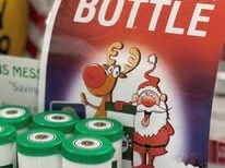 message in a bottle set up at the local pharmacies with the new Christmas poster