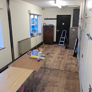 Room painted in "Calming Cream" and dirty old floor tiles ripped out