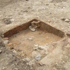 Believed to be a plunge pool in a bath suite from trench 1. You can see the special pink coloured water proofing plaster that the Romans used.