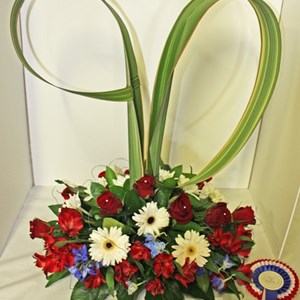 An  arrangement entered in one of the Village Show Classes