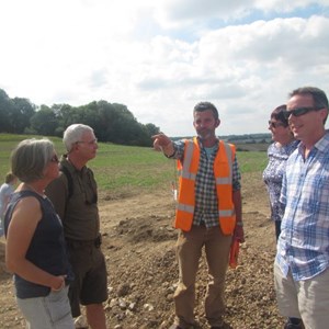 Matt explaining the site to locals