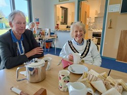 The President of Batchwood Hall Bowling Club Ian Connaughton having tea with the Mayor