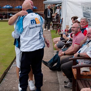 A bear Hug from the President for the new EBA Singles Champion, Danny Watcham