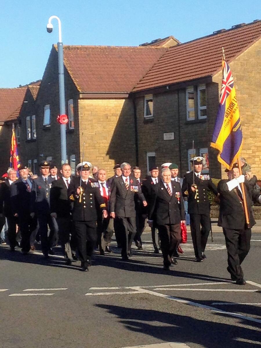 Arthur Obourne with wreath leads RBL parade