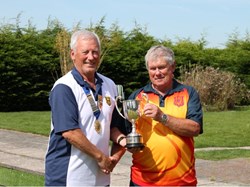 Bob Goodyear presenting trophy to Alton  Social captain Dave Atwell