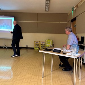 Annual Assembly of the Parish 2026 - Presentation from our Climate and Nature Champion. Chair David Smith looks on.
