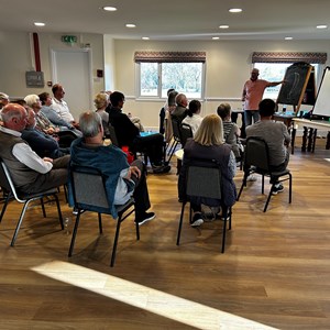 An indoor coaching session (on a blackboard not grass)