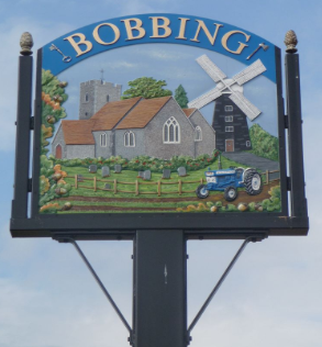 Bobbing village sign