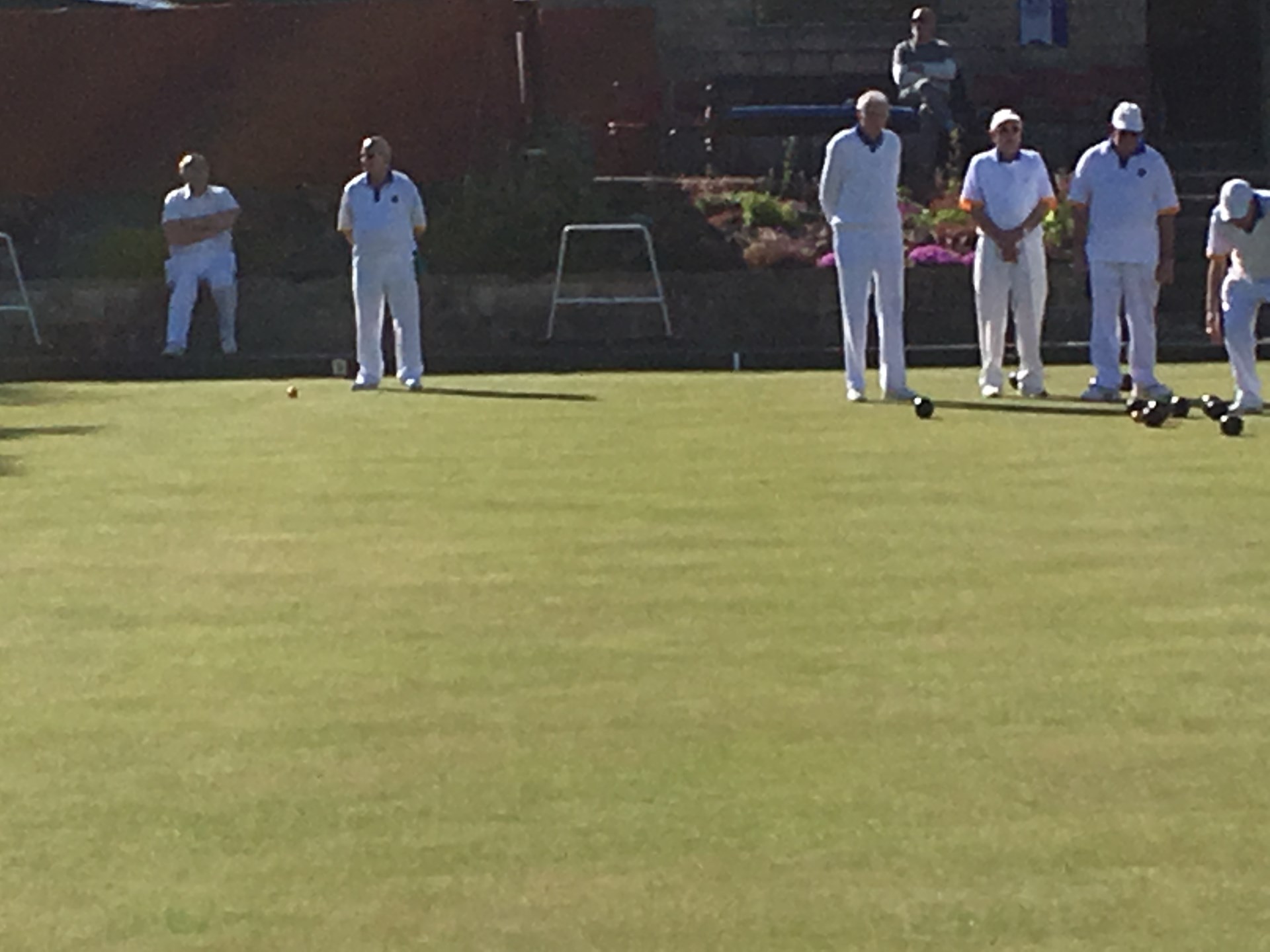 Match gear, whites and club shirts, but hats are optional