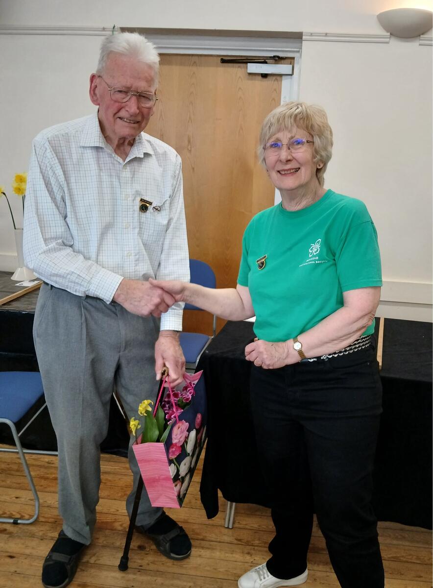 Ivan being presented with a thankyou gift on his 90th birthday Ivan being presented with a thankyou gift on his 90th birthday