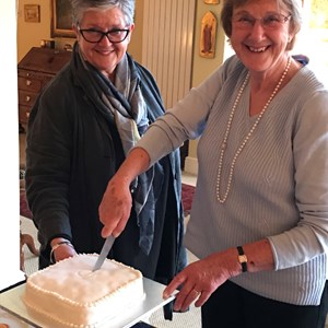 Old and new Halam WI Presidents cutting our Birthday cake