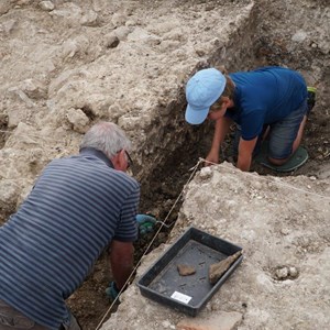 Jim with some serious help from Joel in trench 1.