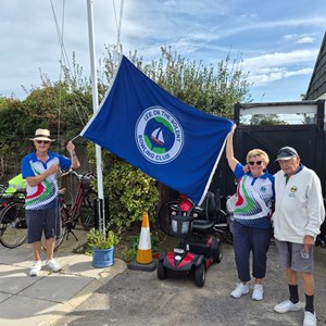 New flag presented by Kathleen & Robert Knights and Peter Cook