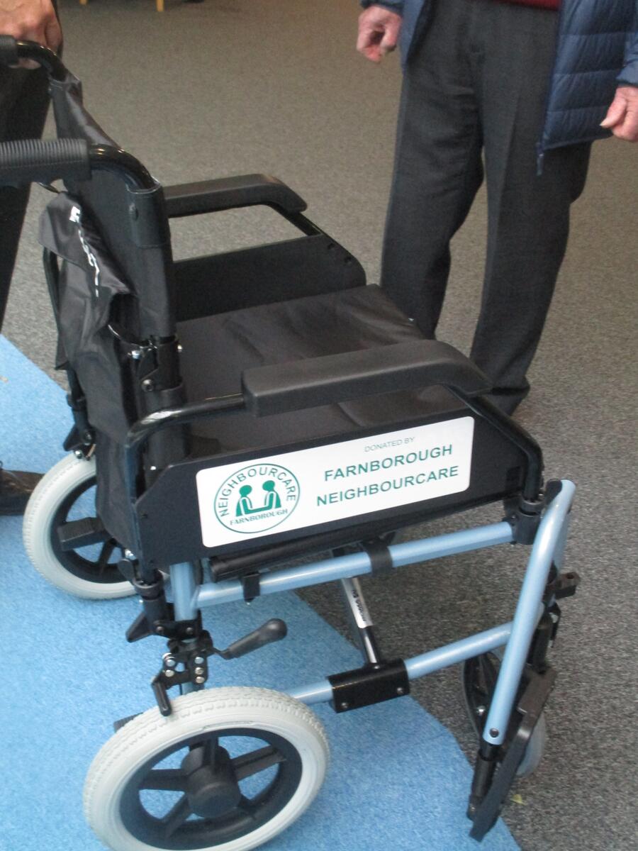 Wheelchair presented to Aldershot Centre for Health by Farnborough NeighbourCare