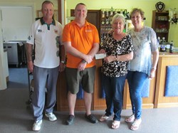 Margaret Bavister presents a £760 cheque to Magpas representative Phil Hayes, the money raised from the 2017 Peter Bavister Memorial charity triples event. Also pictured are her daughter and son-in-law Sue and Martin Welsford.