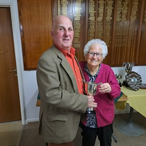 Anne presenting the Alec Whittaker Trophy to winner, Geoff; Mark C and Evelyn were absent