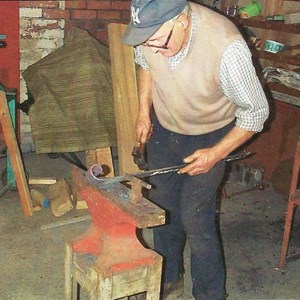Brian Mallinson in his Forge ay KOE